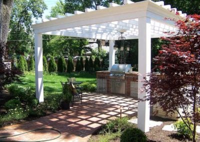 large-white-pergola-over-outdoor-grilling-patio